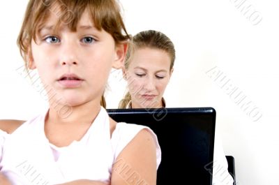 cute girl and mother with notebook