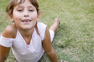 pretty young girl playing in the garden