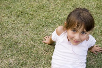 pretty young girl playing in the garden