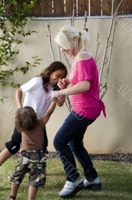 mother playing with her sons