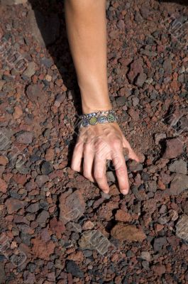 woman hand pick up stones woman hand pick up stones