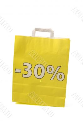 yellow shopping bag with 30 % discount