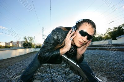 DJ listening to the rails