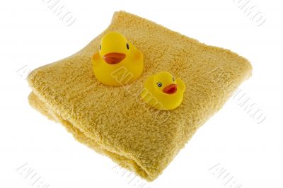 rubber duck sits on towel