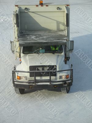 a truck on snow driving on white snow a truck on snow driving on white snow