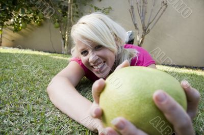 caucasian woman posing with sweet lime