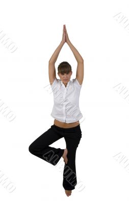 woman doing yoga on one leg