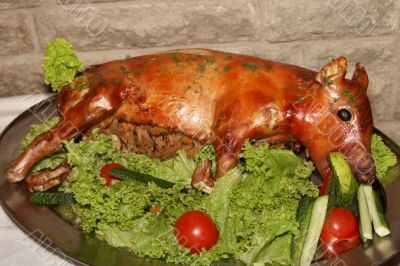 Roasted whole pig