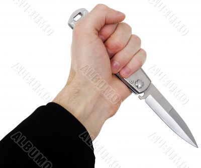 Hand with a knife on a white background
