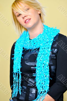 Frontal shot of blonde woman posing with scarf