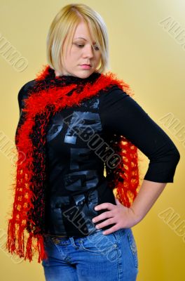 Frontal shot of blonde woman posing with scarf