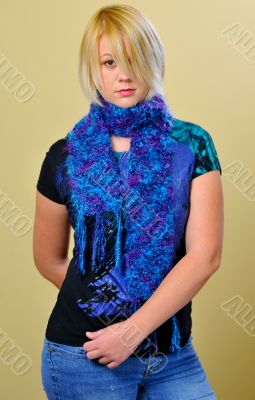 Frontal shot of blonde woman posing with scarf