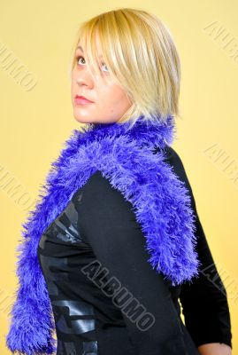 Frontal shot of blonde woman posing with scarf