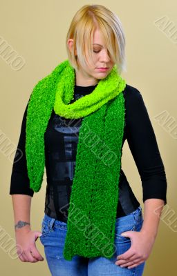 Frontal shot of blonde woman posing with scarf