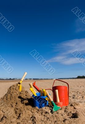 Beach toys in the sandy beach