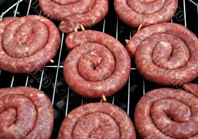 Thuringian Bratwurst on a barbecue grill Thuringian Bratwurst on a barbecue grill