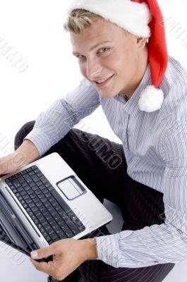 smiling man with laptop