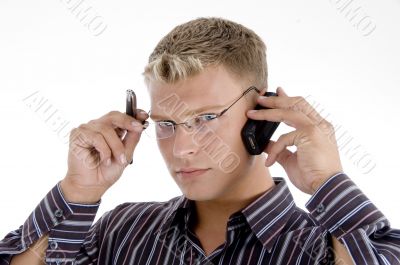 serious businessman communicating on cell phone