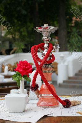 Hookah and red rose in vase Hookah and red rose in vase