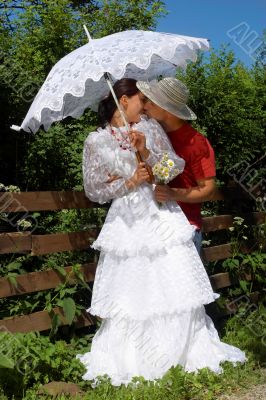 Young happy kissing couple