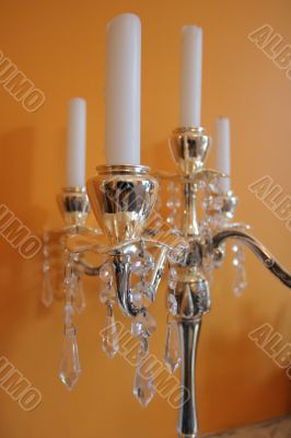 candles on a golden candleholder