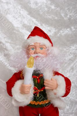 Christmas Santa Claus puppet with a candle