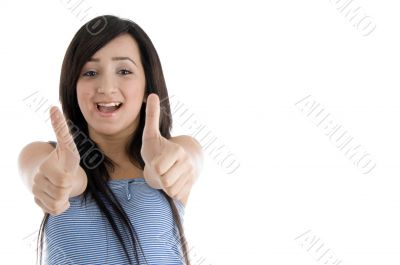 happy  teenager female showing goodluck sign