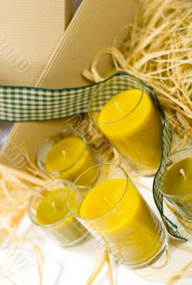 yellow candles, ribbon and box
