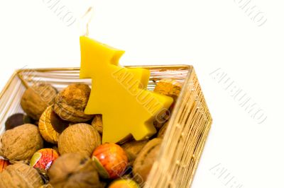 walnuts, sweets and handmade candle