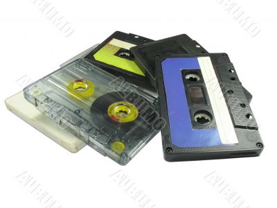 Old audio cassettes isolated over white background