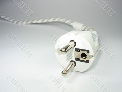 Macro of white two pin plug focused on front Macro of white two pin plug focused on front