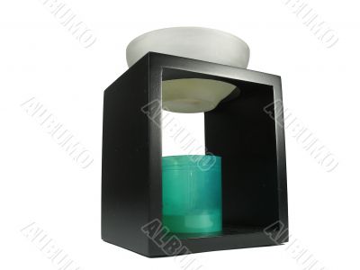 Chinese aroma lamp with candle over white background