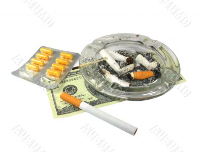 cigarette, money, ash-trash, and drugs isolated on white