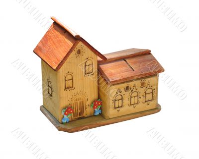 small wooden toy house isolated over white background