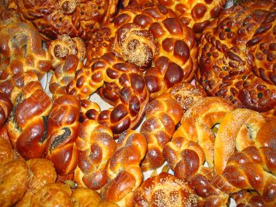 big assortment of sweet baked bread products