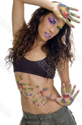 female posing with colorful hands and make up