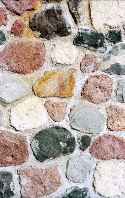 Multicolored stone wall vertical