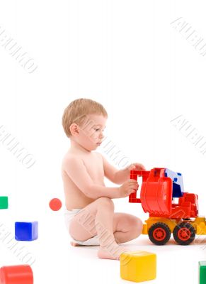 Little boy play with toys