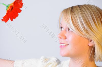 Blond Woman with a Bright Orange Flower Blond Woman with a Bright Orange Flower