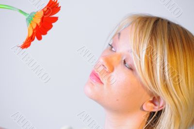 Blond woman with an Orange Flower Blond woman with an Orange Flower