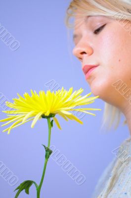 Blond Woman with a Bright Yellow Flower Blond Woman with a Bright Yellow Flower