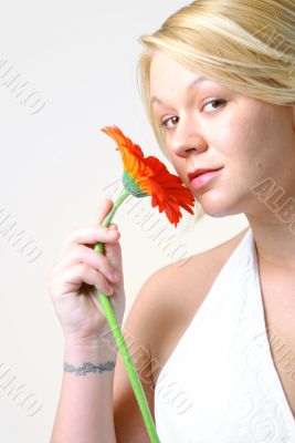 Blond Woman with an Orange Flower Blond Woman with an Orange Flower