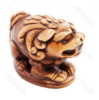 Brown statuette of dog