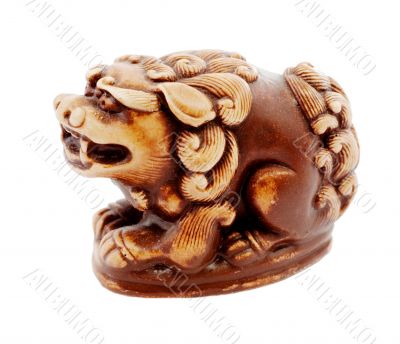 Brown statuette of dog