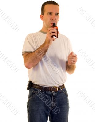 Man Smelling Cough Medicine Man Smelling Cough Medicine