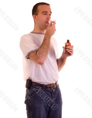 Man Swallowing Medicine