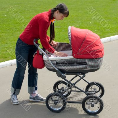 Woman with baby carriage