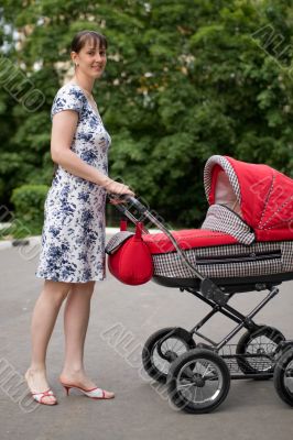 Woman with baby carriage