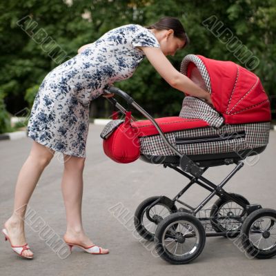 Woman with baby carriage