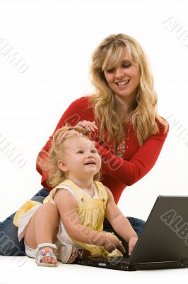 Mom and baby with laptop